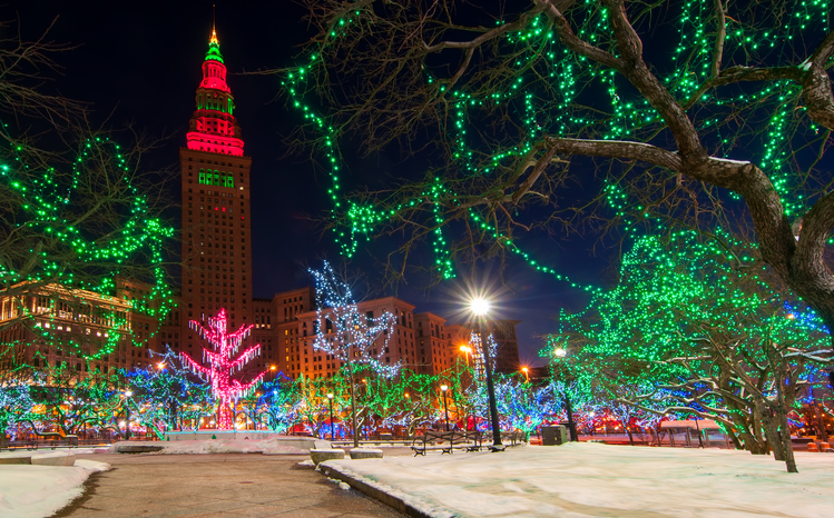 The Terminal Tower and Public Square in Cleveland Ohio colorfully lit up for Christmas
